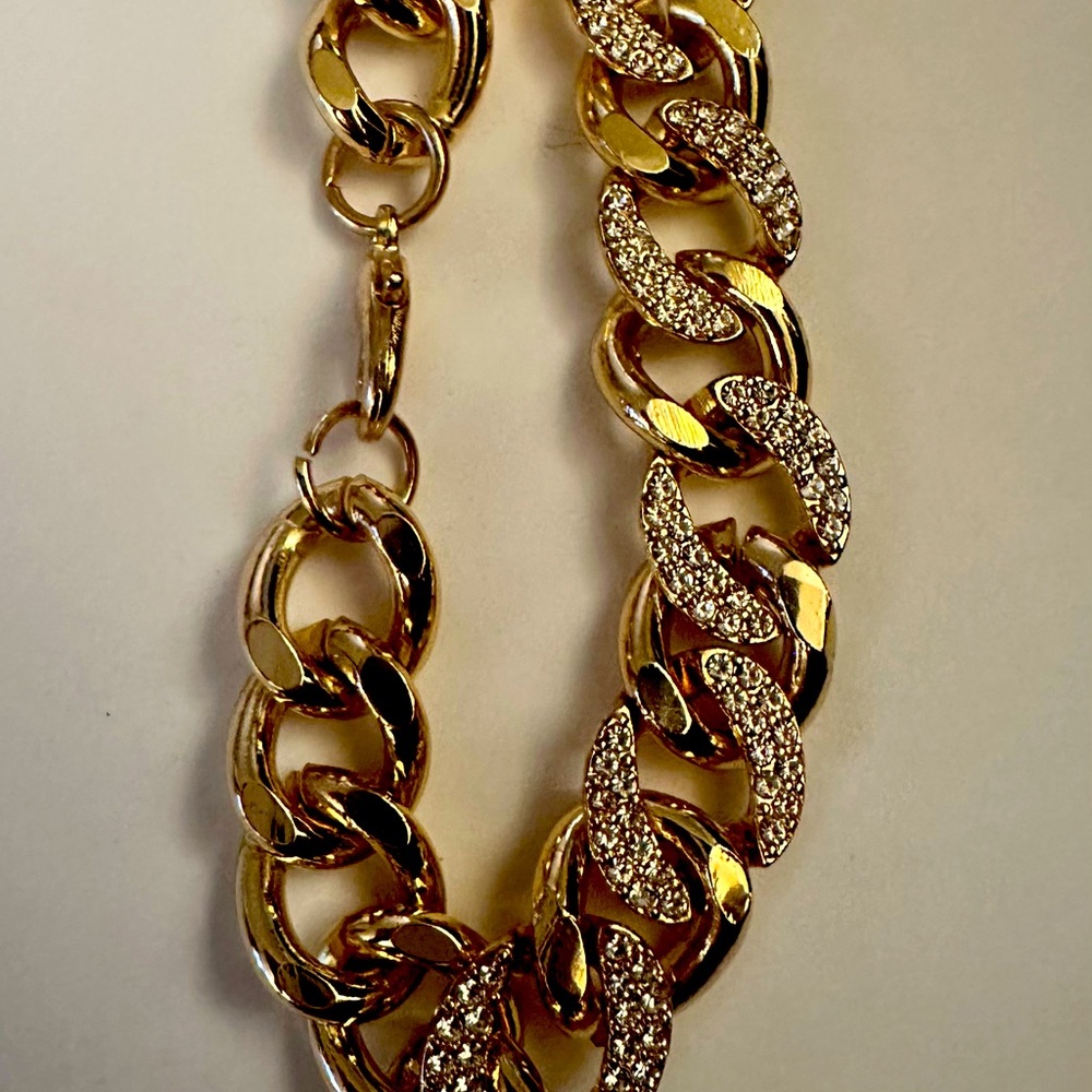gold-tone or silver-tone bracelet with crystal accents; length: 203mm